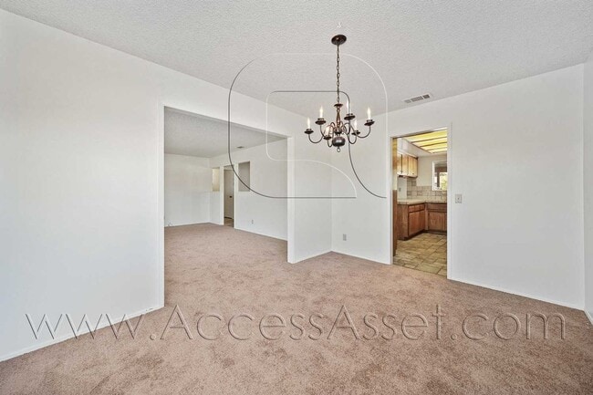 Building Photo - Single-Story 3 Bed with Covered Patio & Gated Yard