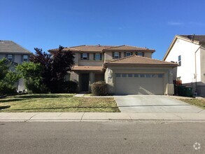 Building Photo - Specious Home has 5Br and 3Ba.