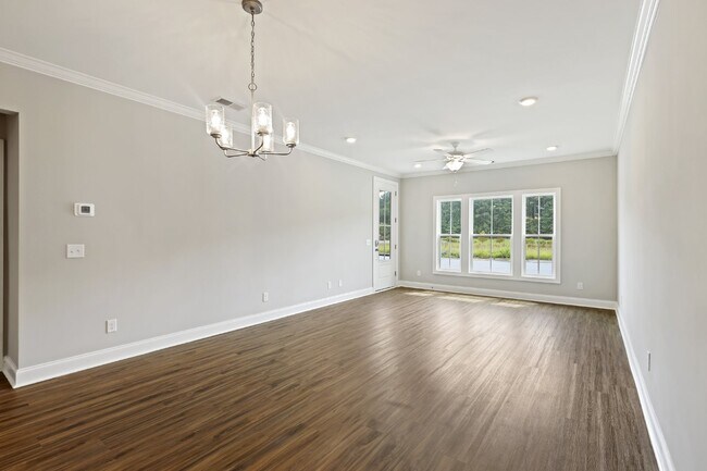 Building Photo - Spacious townhome with a wooded view! Spec...