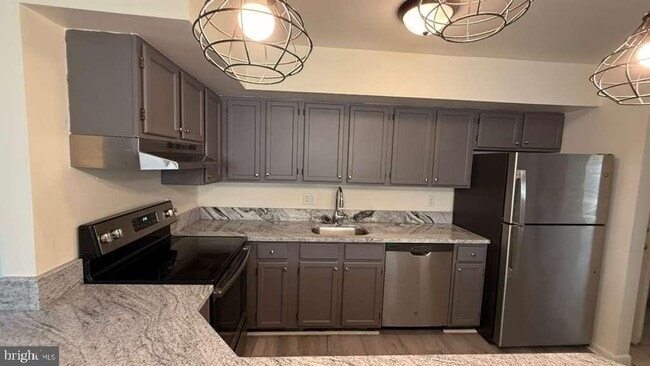 Building Photo - 8103 Greenspring Way