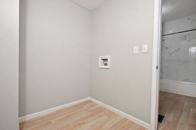 Building Photo - Updated 4-bedroom, 2-bathroom house!