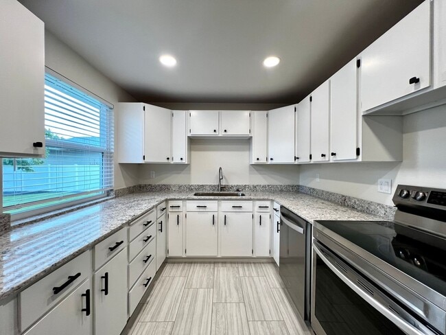Building Photo - Non-Refundable & Security Deposit Total: $2400.00