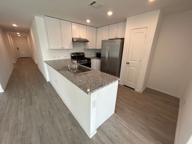Building Photo - Modern 4-Bedroom Living with Community Pool Access!