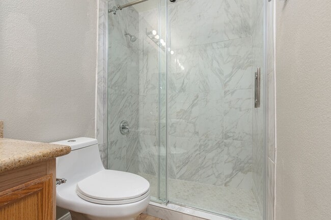 Building Photo - Remodeled first floor unit in gated commun...