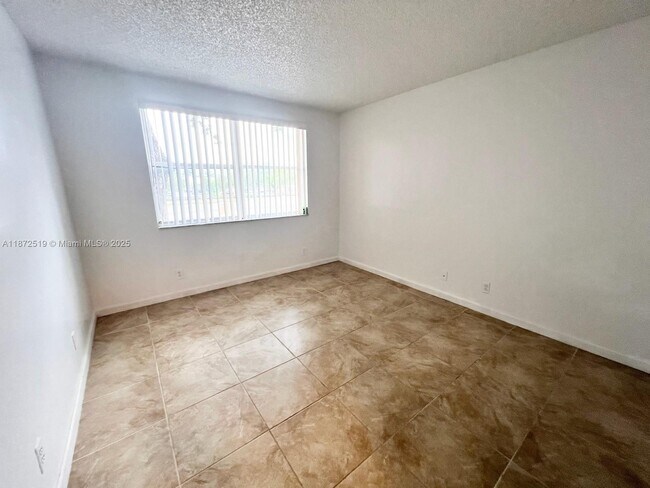 Building Photo - 8977 Wiles Rd