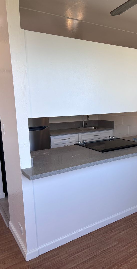 Building Photo - Available now: A 2 Bedroom, 1 bathroom with 1 assigned parking stall in Hokuahiahi Apartments