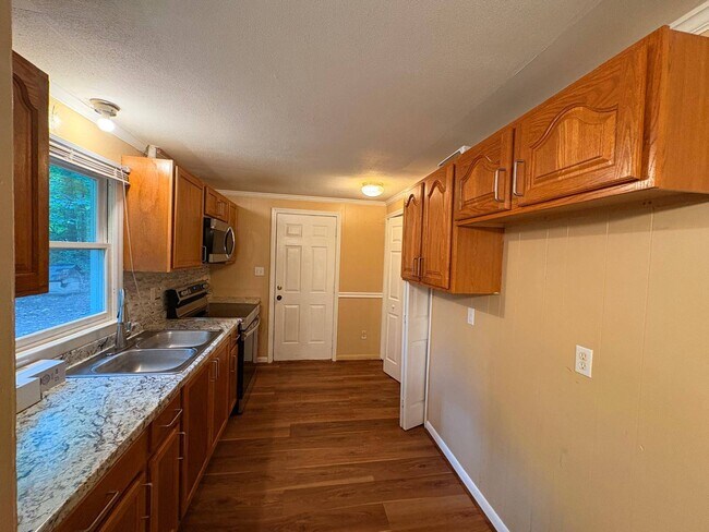 Building Photo - 5323 Eno River Dr