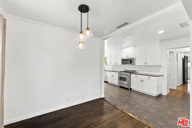Building Photo - 4415 Woodland Ave