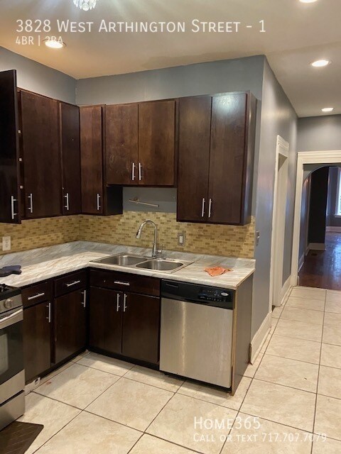 Building Photo - Stunning 4 Bedroom, 2 Bath Duplex