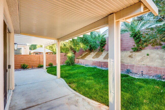 Building Photo - FULLY FURNISHED! Exudes sophistication wit...