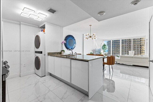 Building Photo - 10275 Collins Ave