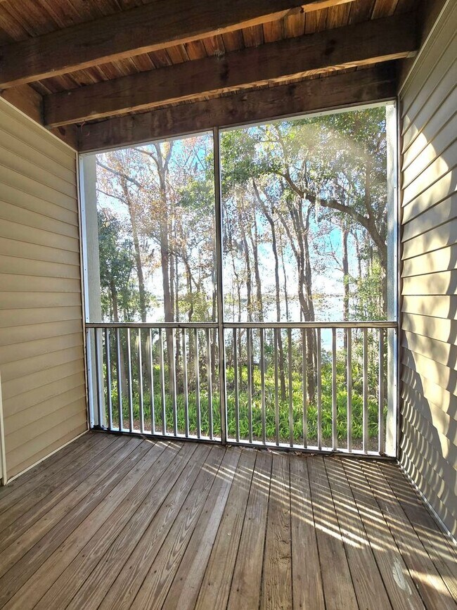 Building Photo - Beautiful 2BR/2BA Condo in Sunset Lakes – Lake & Tree Views!