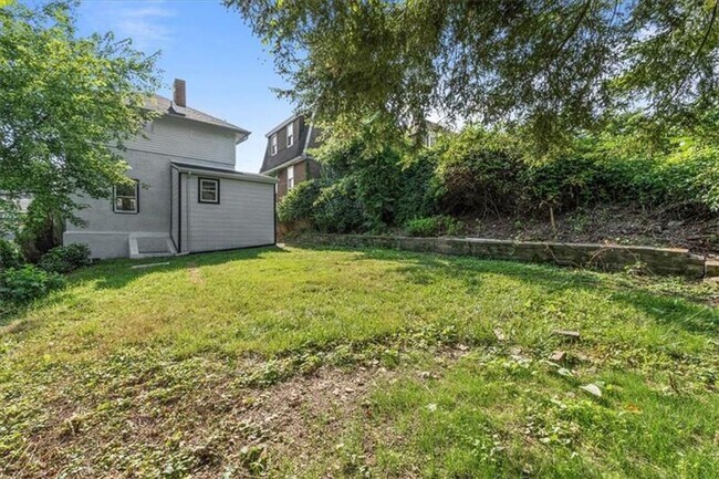 Building Photo - Spacious 4-Bedroom Home with Modern Updates & Private Driveway