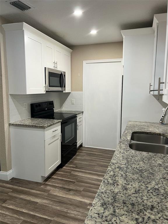 Building Photo - 8010 Woodvine Pl