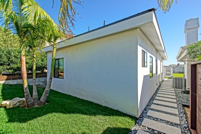 Building Photo - Beautifully Remodeled, Bright & Modern 4BR3BA Home w/ 2BR1BA Guest House On Sprawling Corner Lot ...