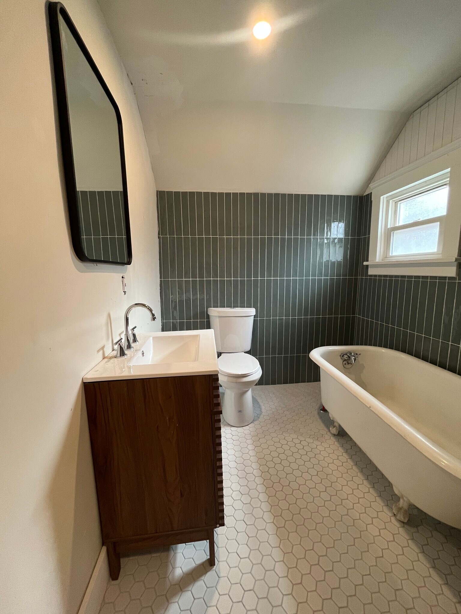 Remodeled bathroom with new tile work - 1382 E 43rd St