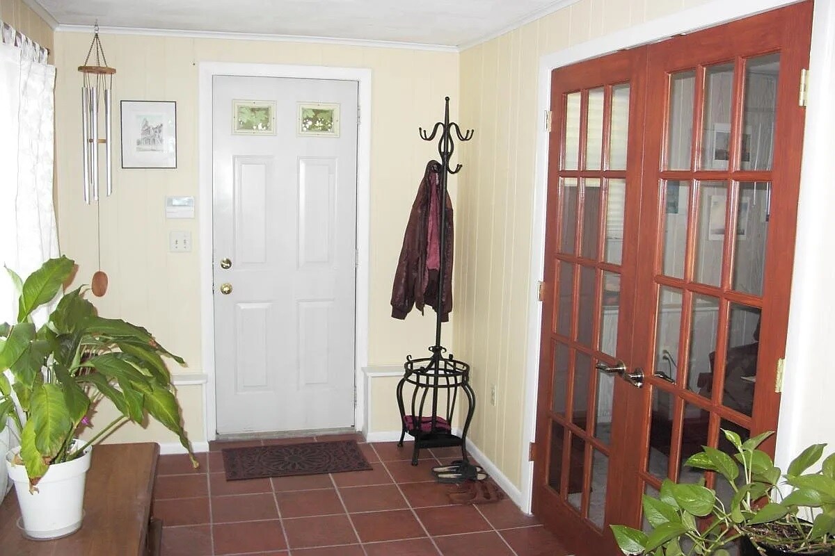 side door to 2nd driveway from the first floor bedroom - 1 Cayuga Dr