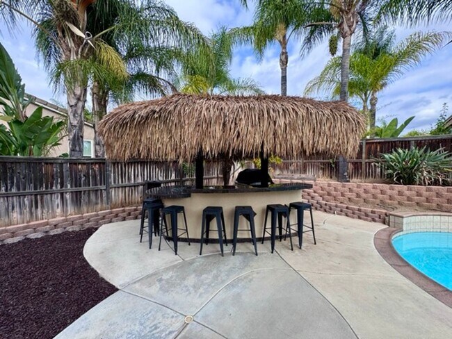 Building Photo - Discover this beautifully upgraded 5 bedro...