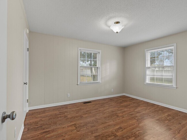 Building Photo - Charming 4-bedroom, 2-bath ranch-style home situated on just over 2 acres!