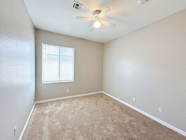 Building Photo - 4 BEDROOM HOME 3 CAR GARAGE ON A CORNER LO...