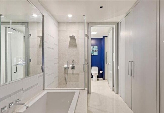 Building Photo - BEAUTIFULLY FURNISHED, MOVE-IN READY HIGH-RISE CONDO WITH STUNNING VIEWS!