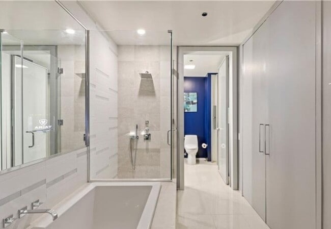 Building Photo - MOVE-IN SPECIAL!! HALF MONTH’S RENT OFF WITH THIS BEAUTIFULLY FURNISHED, HIGH-RISE CONDO WITH STU...