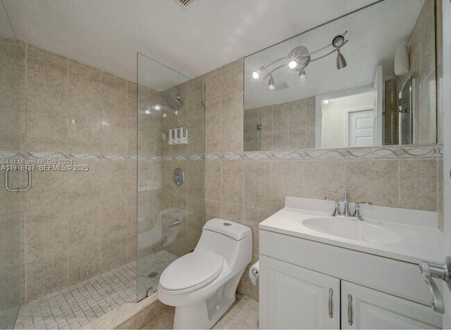 Building Photo - 6950 W 6th Ave