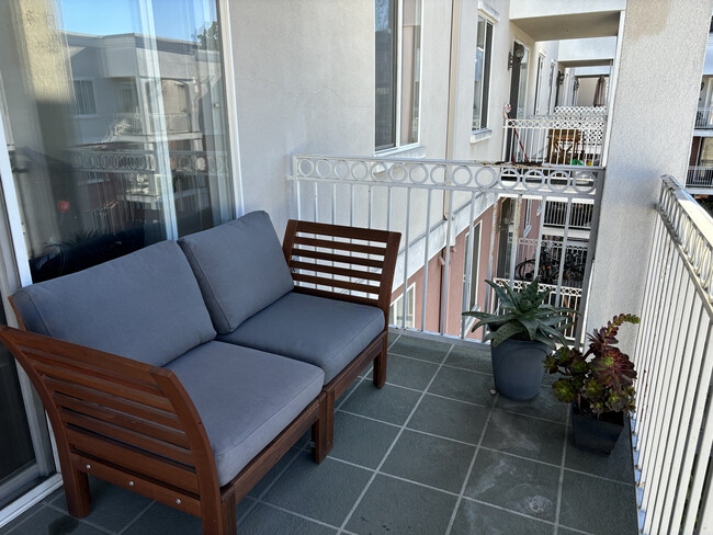 Private balcony with comfortable seating - perfect for morning coffee or evening relaxation - 3740 Santa Rosalia Dr