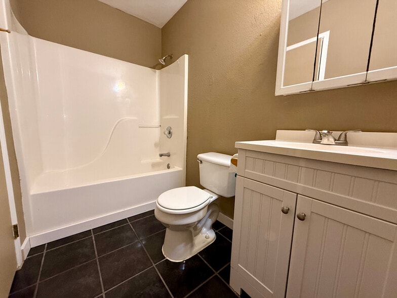 bathroom with under sink and oversink storage - 377 AR 56 Hwy