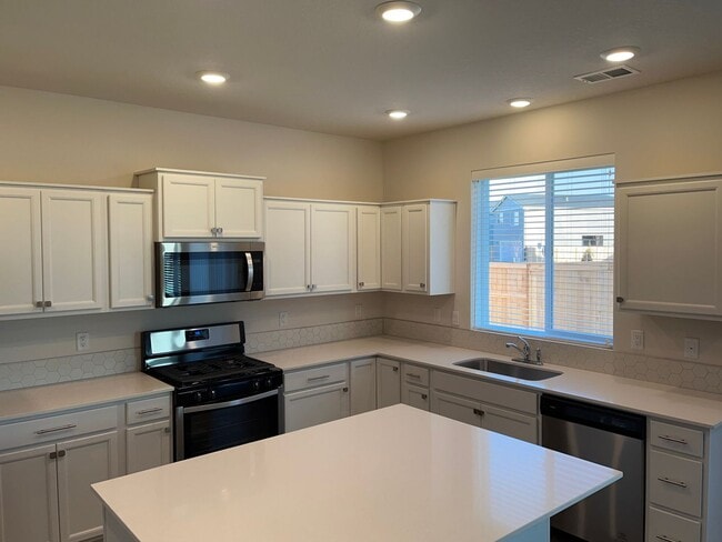 Building Photo - New Construction! Four Bedroom Home in Woo...