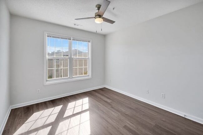 Building Photo - RENT SPECIAL! Freshly Painted! New Luxury ...