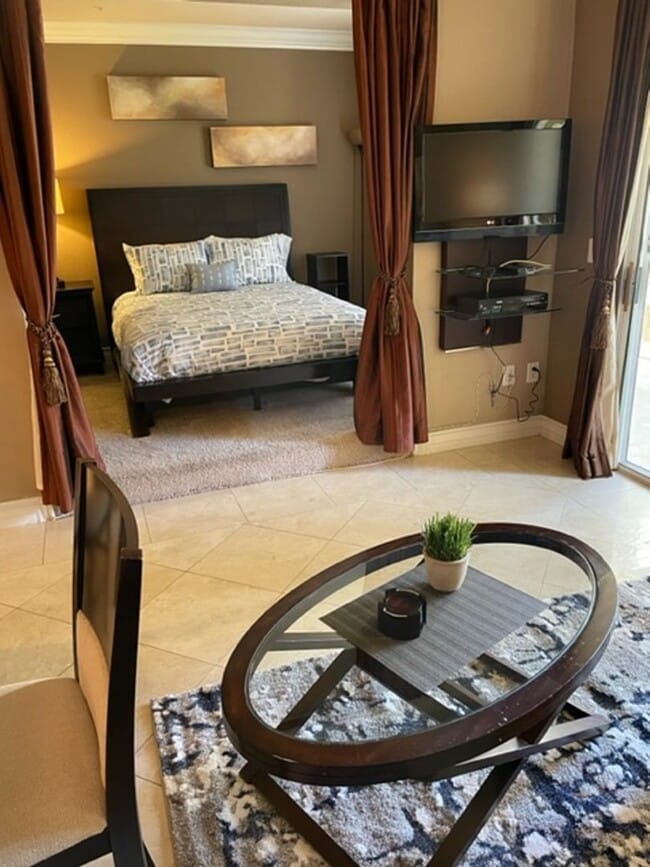 Building Photo - Meridian STUDIO Condo Fully Furnished near Main Pool-Lush Green trees in Resort Style Community.