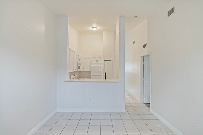 Building Photo - 2-bath condo on the 2nd floor with a newly...