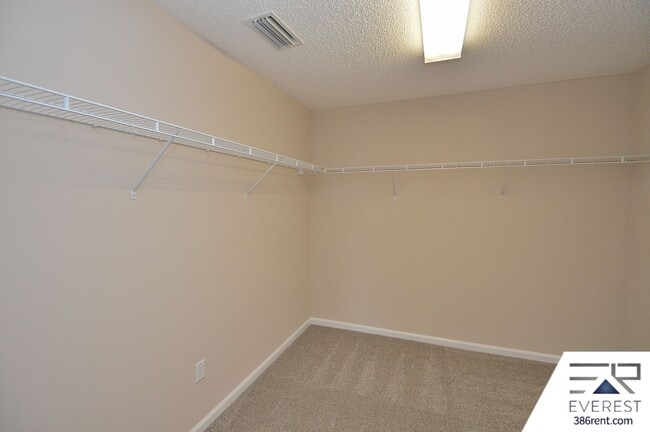 Building Photo - SPACIOUS, FULLY FENCED 4/2.5/2 IN DESIRABLE MATANZAS WOODS