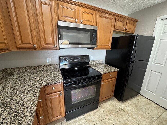 Building Photo - Altamonte Springs Top Floor Condo ~ Gated Waterfront Community ~ Must See!