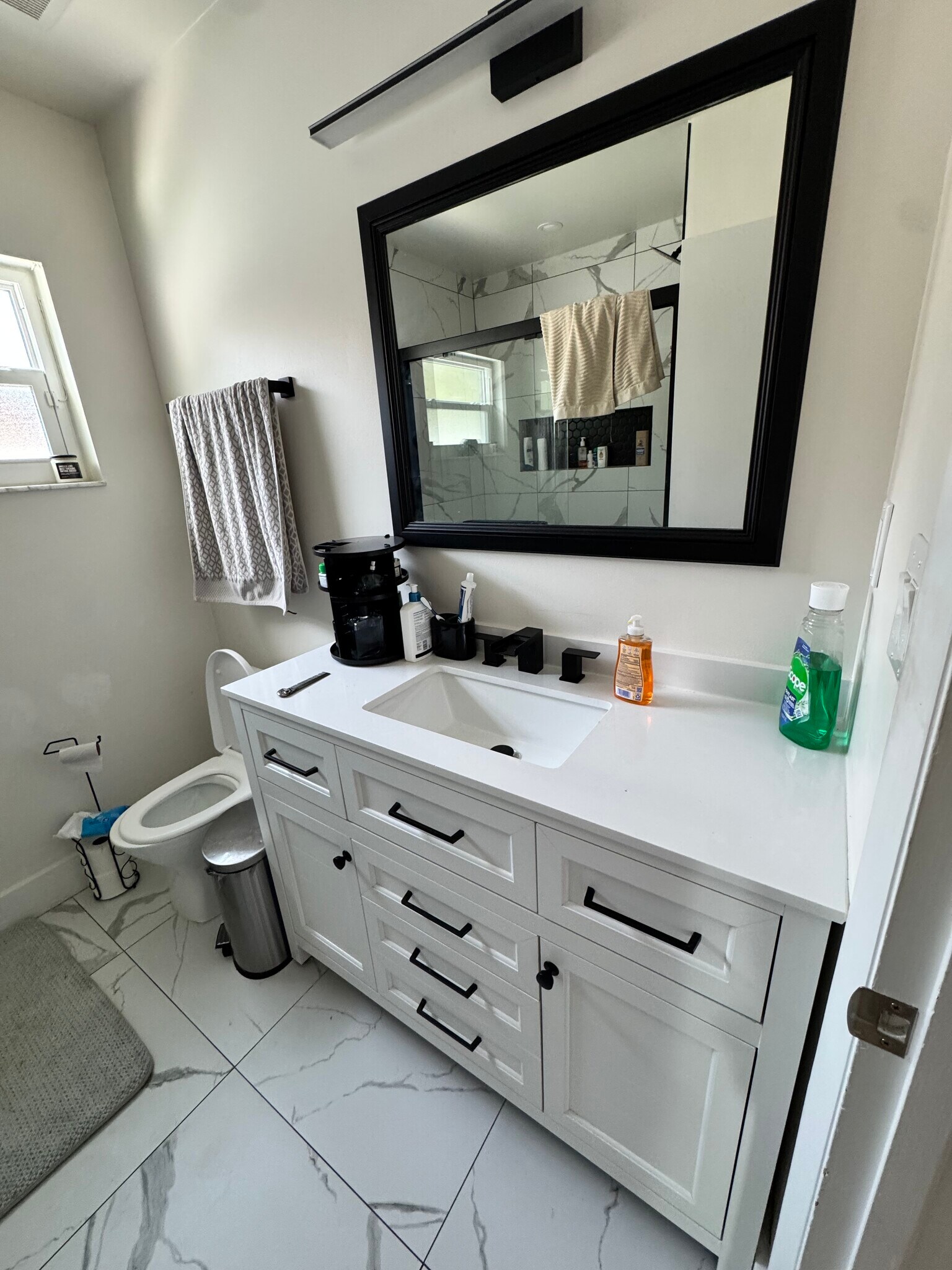 Sink with bright light above - 2161 NW 89th Ter