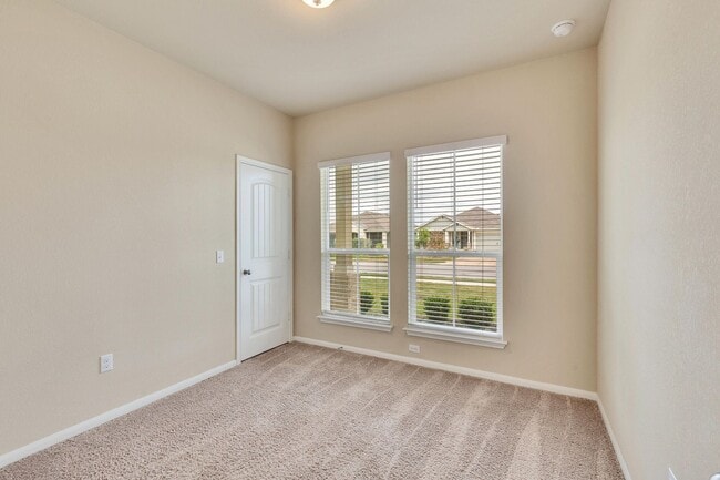 Building Photo - Modern Elegance Awaits: Discover Your Oasis in Hutto, TX