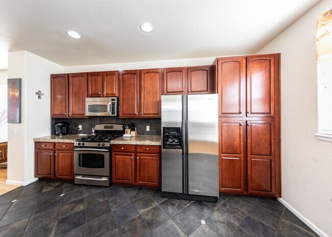 Building Photo - Downtown 3 Bedroom Townhome with 2 Car Garage