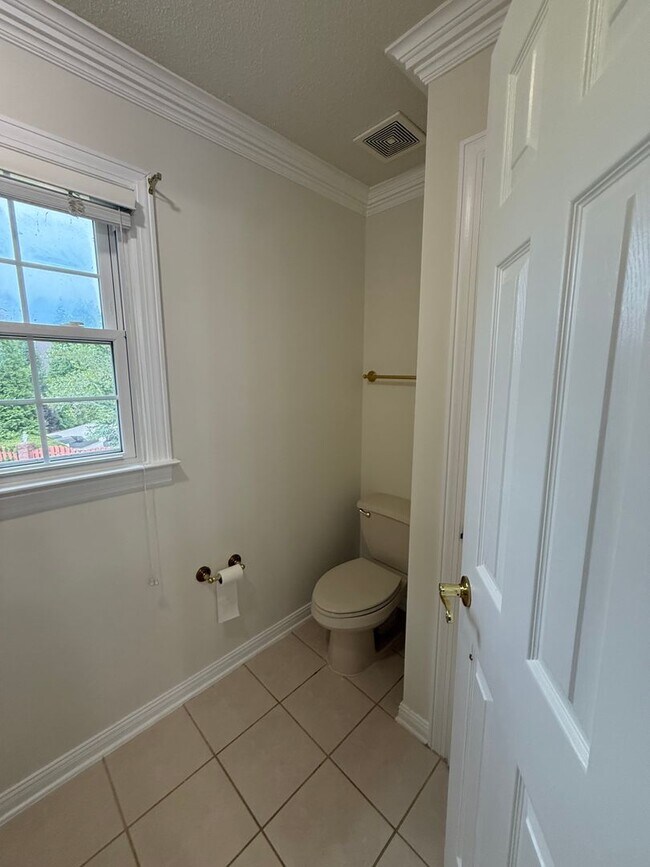 Building Photo - Spacious 5-Bedroom Home on a Corner Lot in...