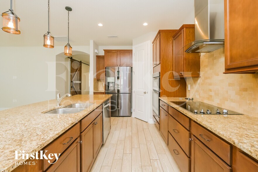 Building Photo - 16303 Treasure Point Dr
