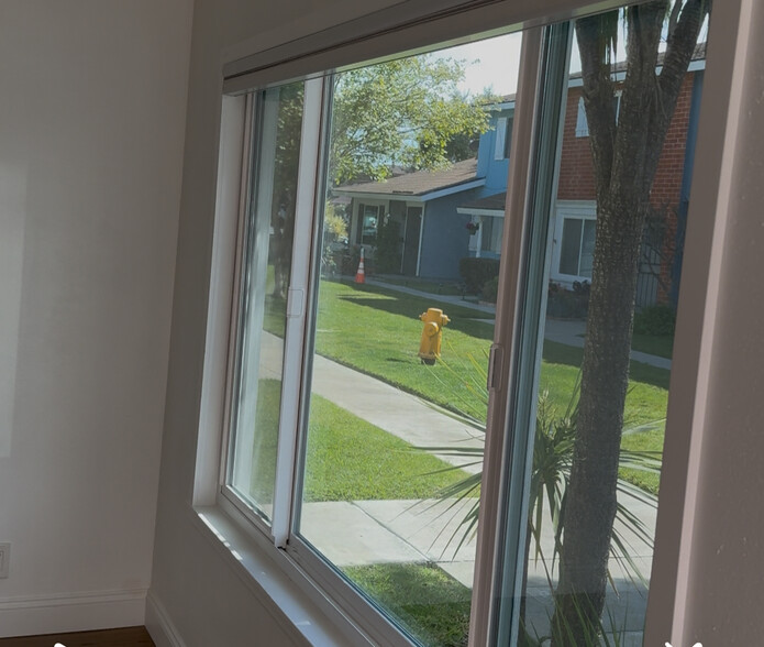 Large living room window with remote shade and plenty of light - 10152 Ascot Cir