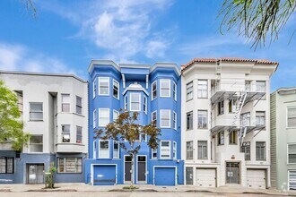 Building Photo - Stylish Top-Floor Two Bedroom and One and ...