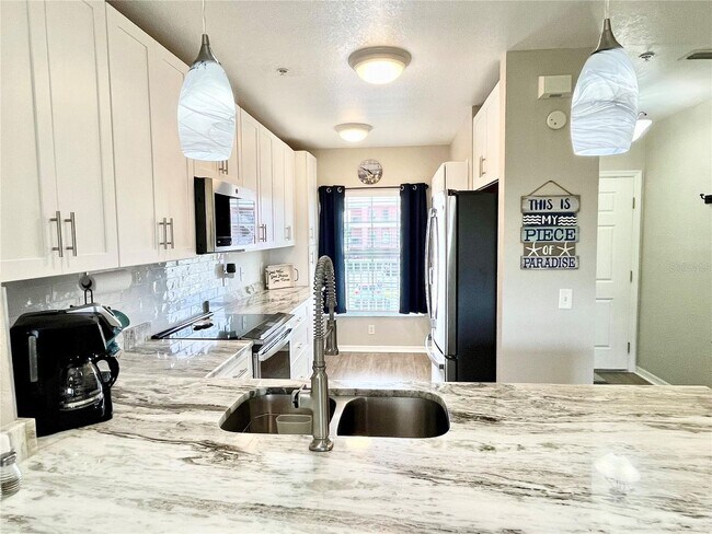 Building Photo - AVAILABLE 2026 SEASON! HERITAGE LAKES COND...