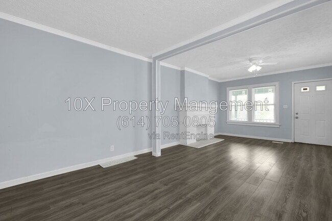Building Photo - 1311 E 24th Ave