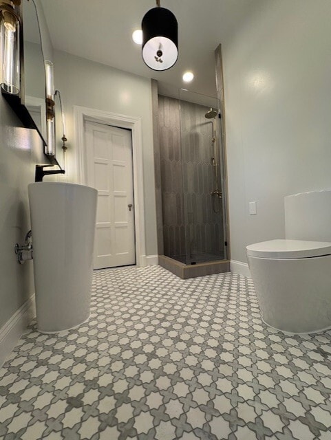 Shared bathroom with luxury concrete tile shower, marble mosaic flooring and double sinks - 5553 Little Falls Rd