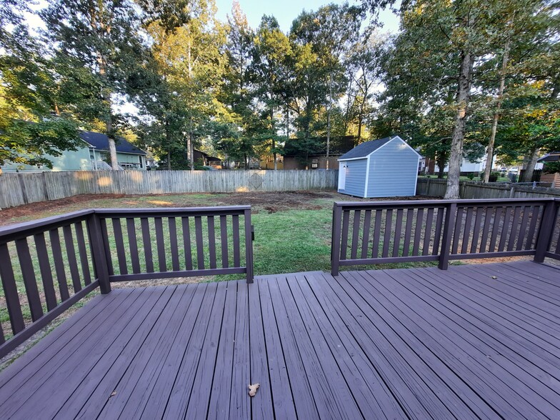 Beautiful deck overlooking fenced-in backyard - 1717 Old Barn Rd