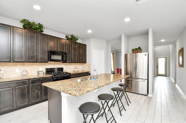 Building Photo - 8802 Mallow Rose Wy