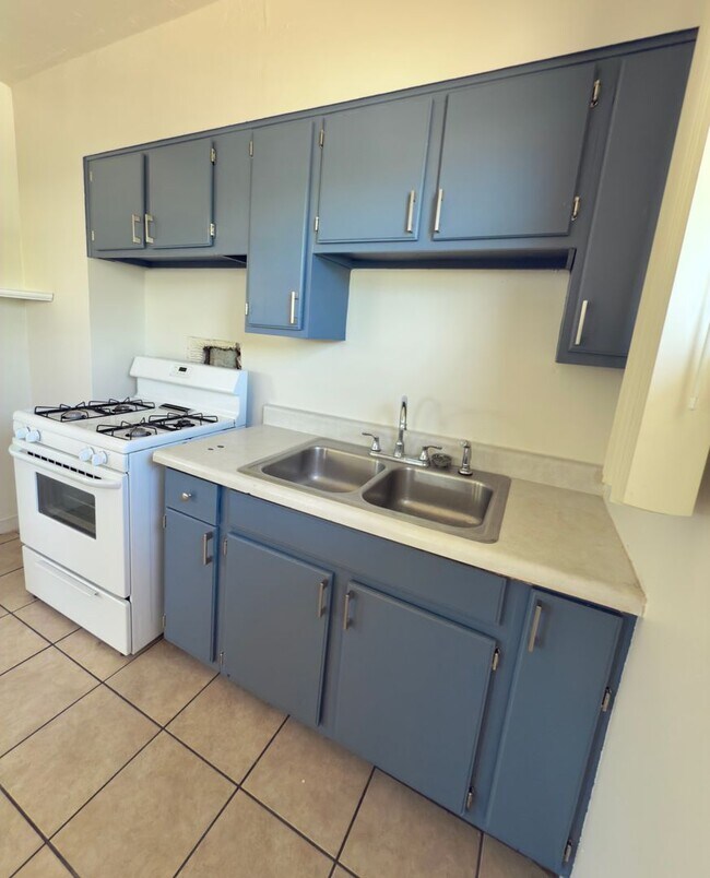 Building Photo - Two Bedroom w/ A/C, Yard and Carport