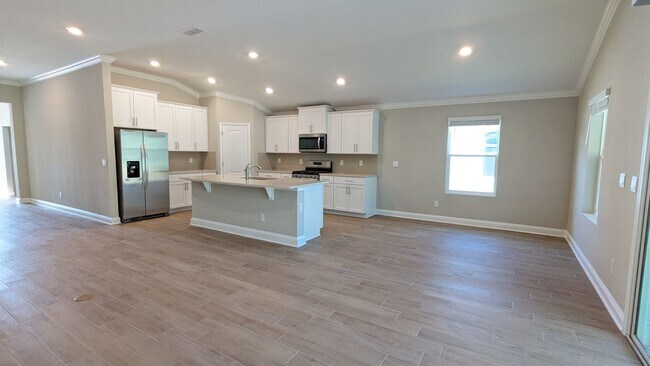 Building Photo - ENJOY this price on our 18mo Lease. Both 1...