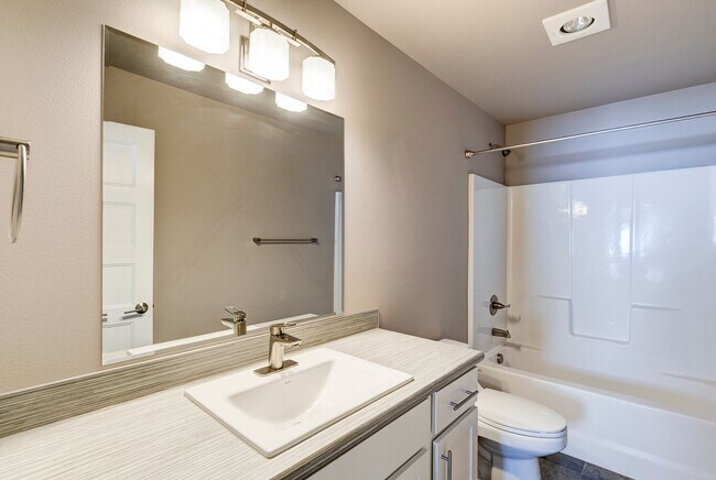 Building Photo - Stylish 3-Bedroom Home with Fenced Yard